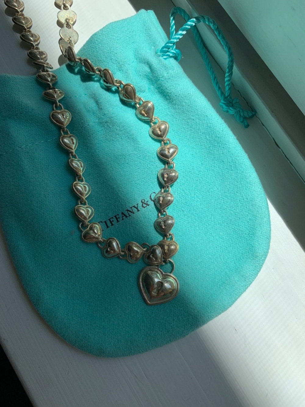 Tiffany & Co. Sterling Silver Continuous Heart Link Necklace with Heart Locket